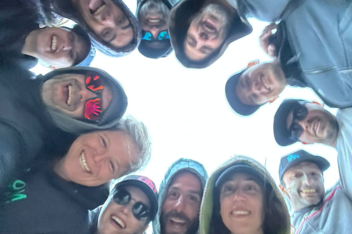 EK Experience crew grouped together smiling after a kiteboarding session