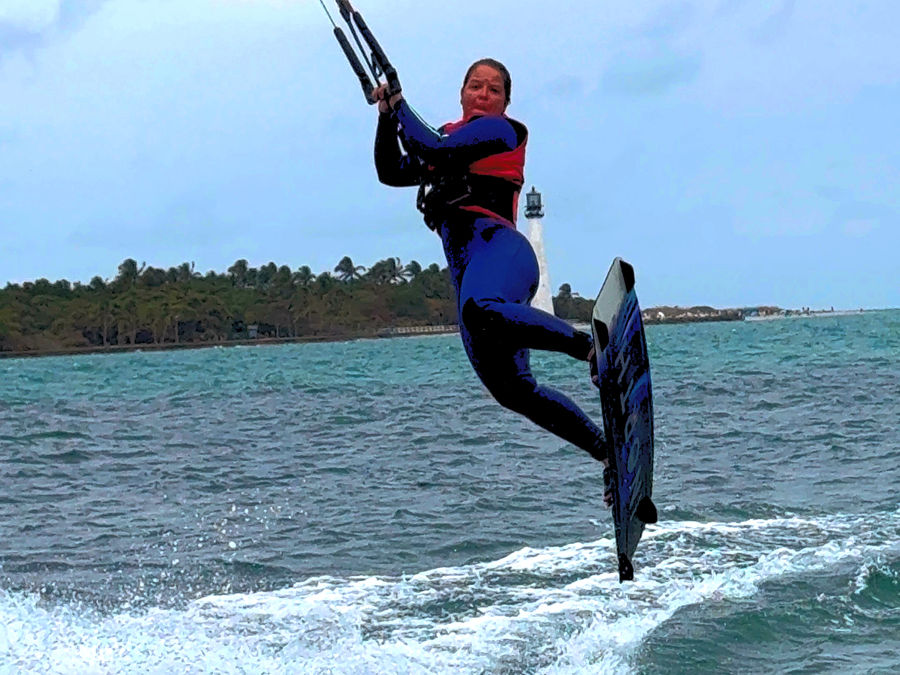 Rider boosting a jump above the water