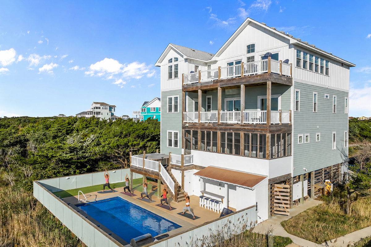 The EK Women's Adventure & Wellness Retreat beach house in Avon, Outer Banks, with its pool deck